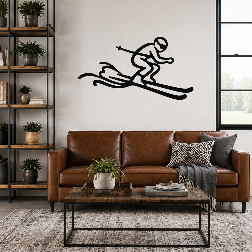 Black metal skier wall art with motion-line cutouts, mounted above a brown leather sofa in a living room.
