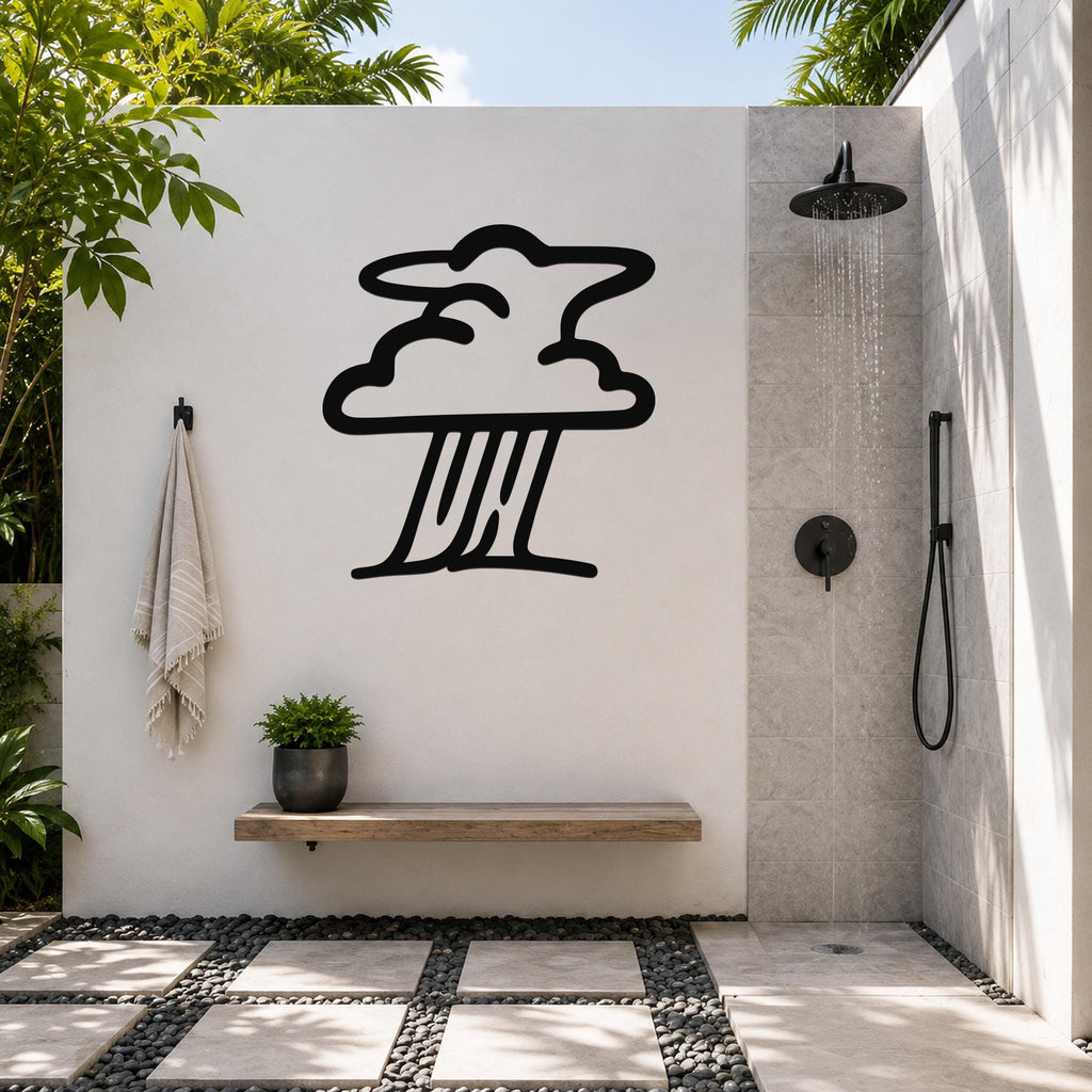 Black metal storm cloud wall art silhouette mounted on a white outdoor shower wall, above a wooden bench with a potted plant, in a tropical patio setting.