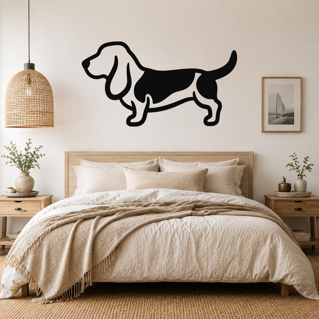 Black metal Basset Hound silhouette wall art mounted above a wooden bed in a neutral bedroom.