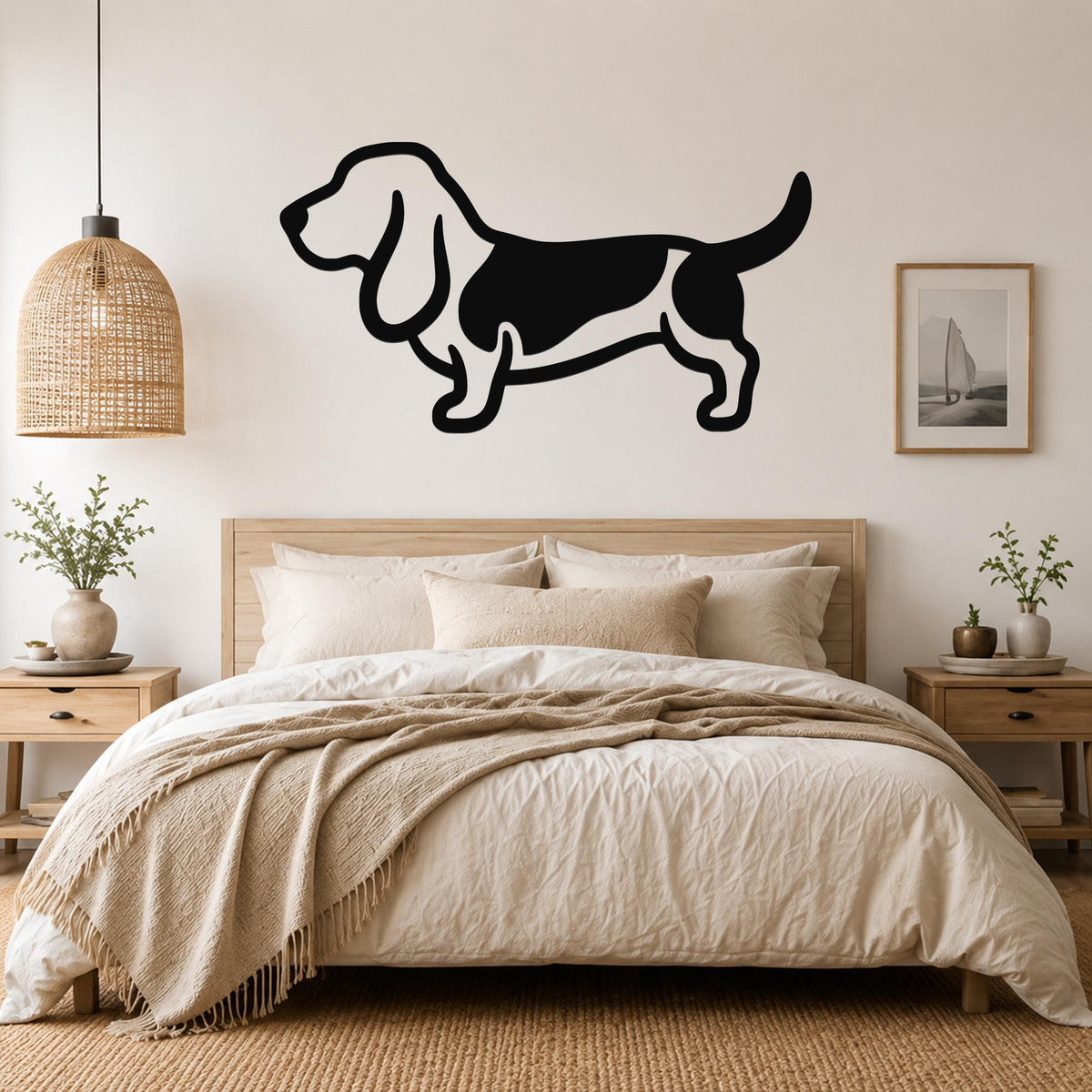 Black metal Basset Hound silhouette wall art mounted above a wooden bed in a neutral bedroom.