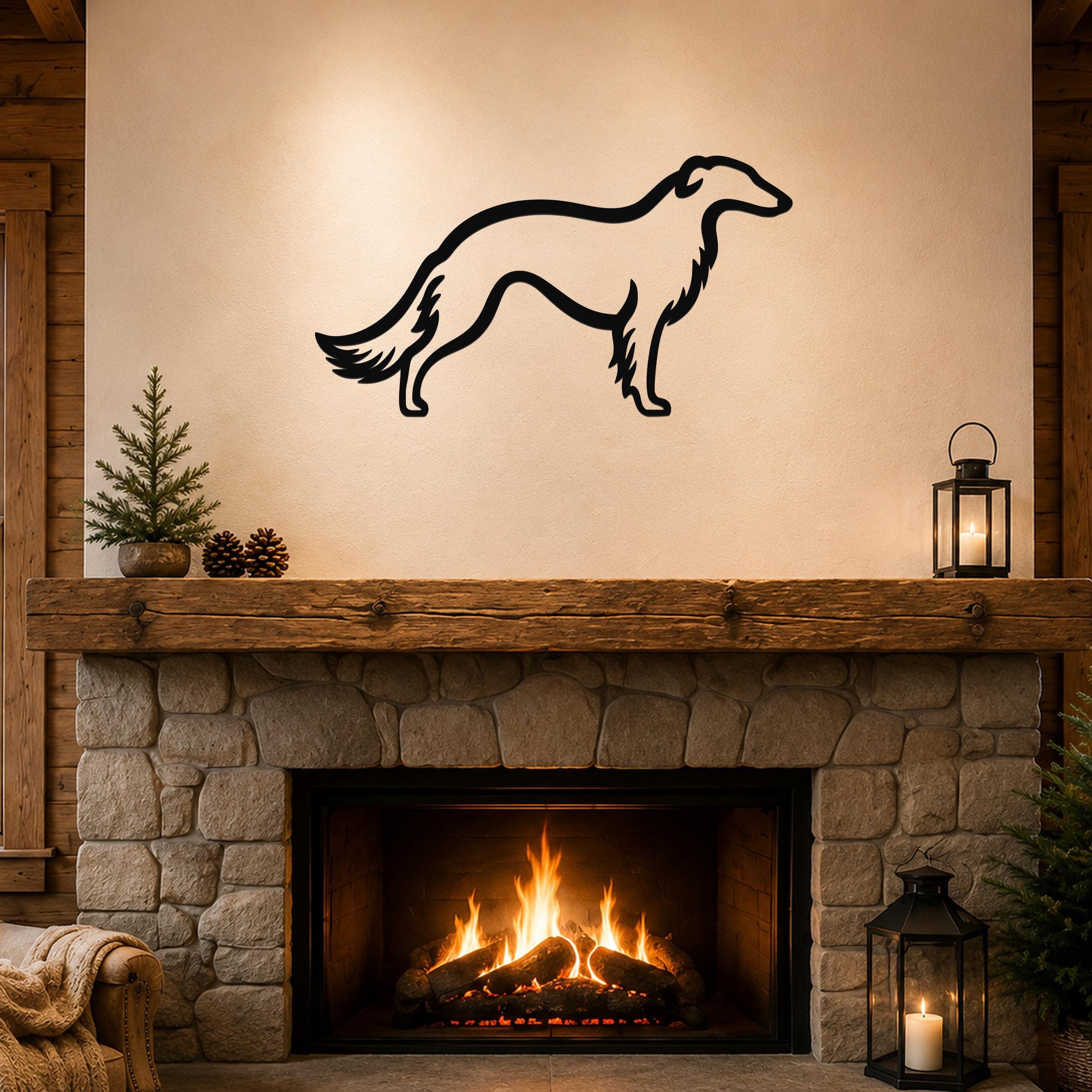 Black metal Borzoi dog silhouette wall art mounted above a stone fireplace in a rustic living room.