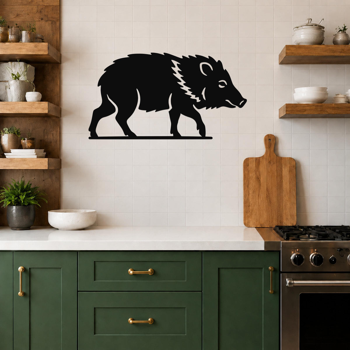 Black metal javelina wall art with a silhouette design, mounted on a kitchen wall above a counter.