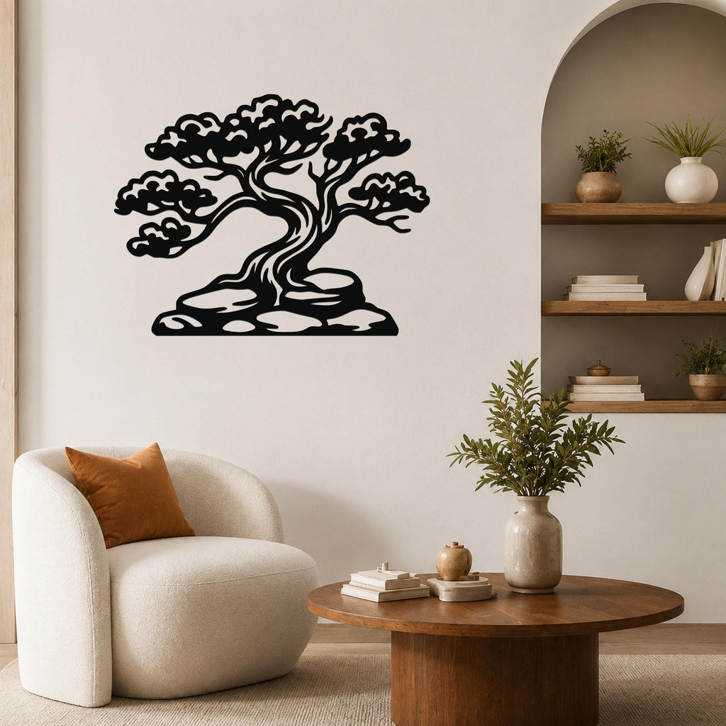 Black metal wall art silhouette of a bonsai-style juniper tree with detailed branches and roots, mounted on a living room wall above a round wooden coffee table.