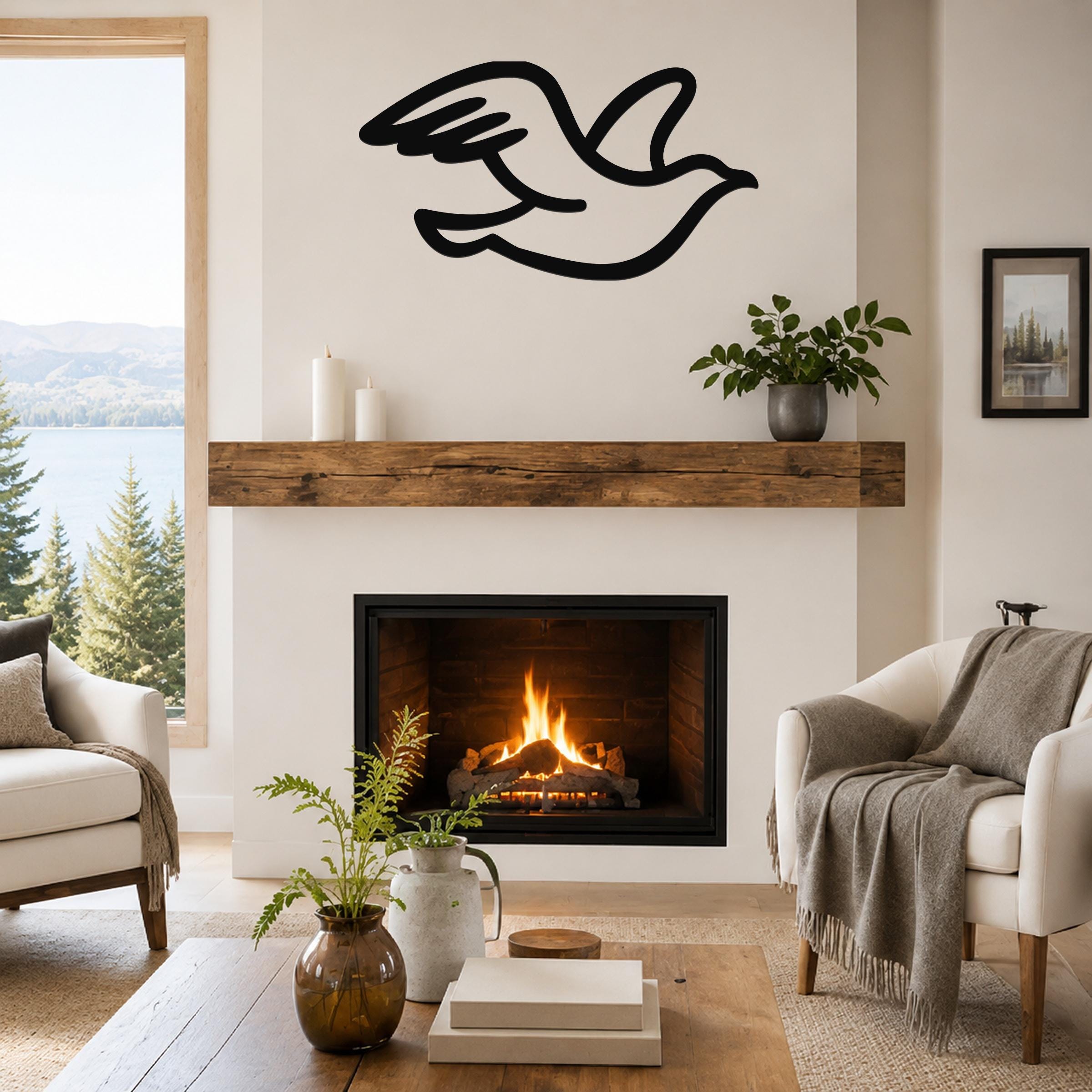 Black metal seagull wall art with motion-line cutouts, mounted above a fireplace in a living room.