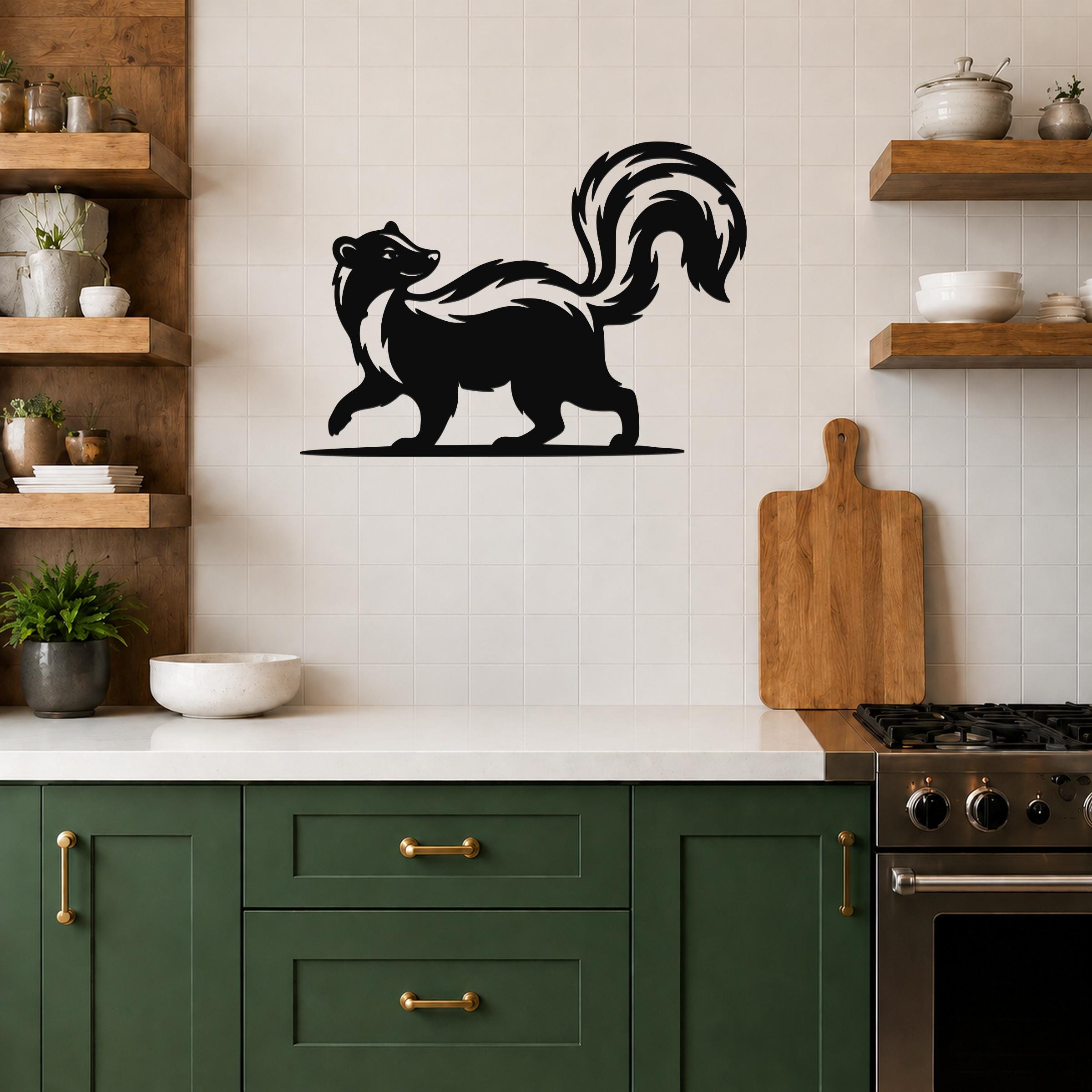 Black metal skunk silhouette wall art with a raised tail, mounted on a tiled kitchen wall above a counter.