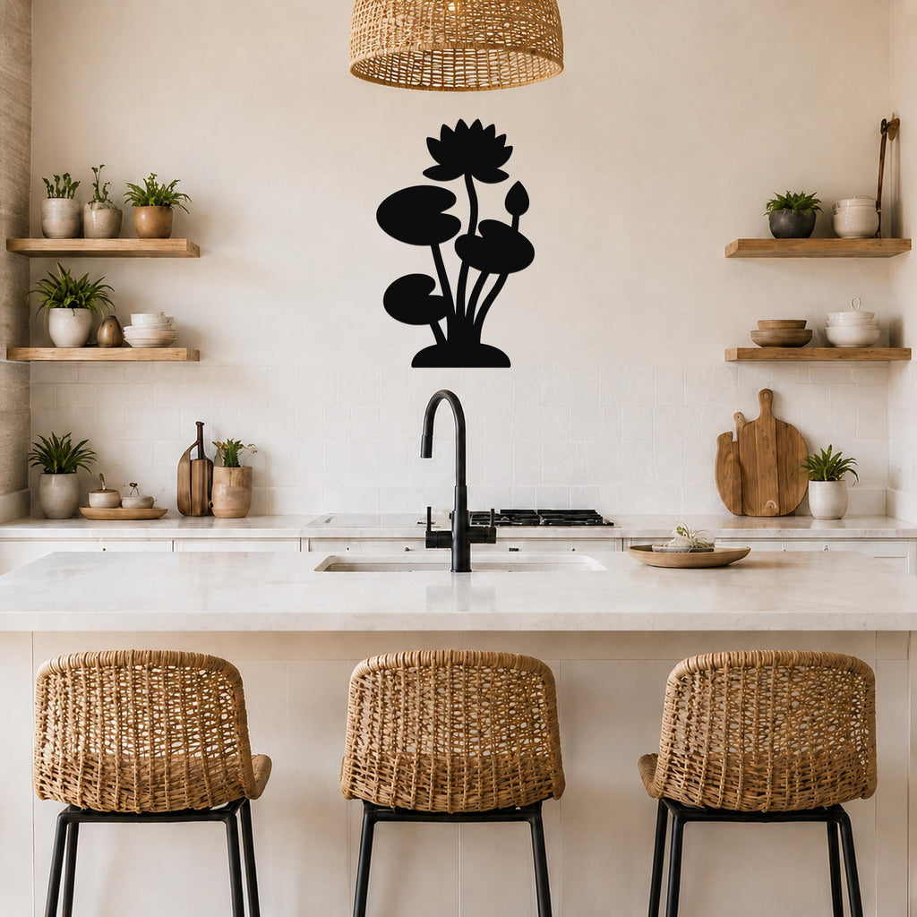 Black metal lotus water lily wall art with flower and leaf cutouts, mounted on a kitchen wall above a counter.