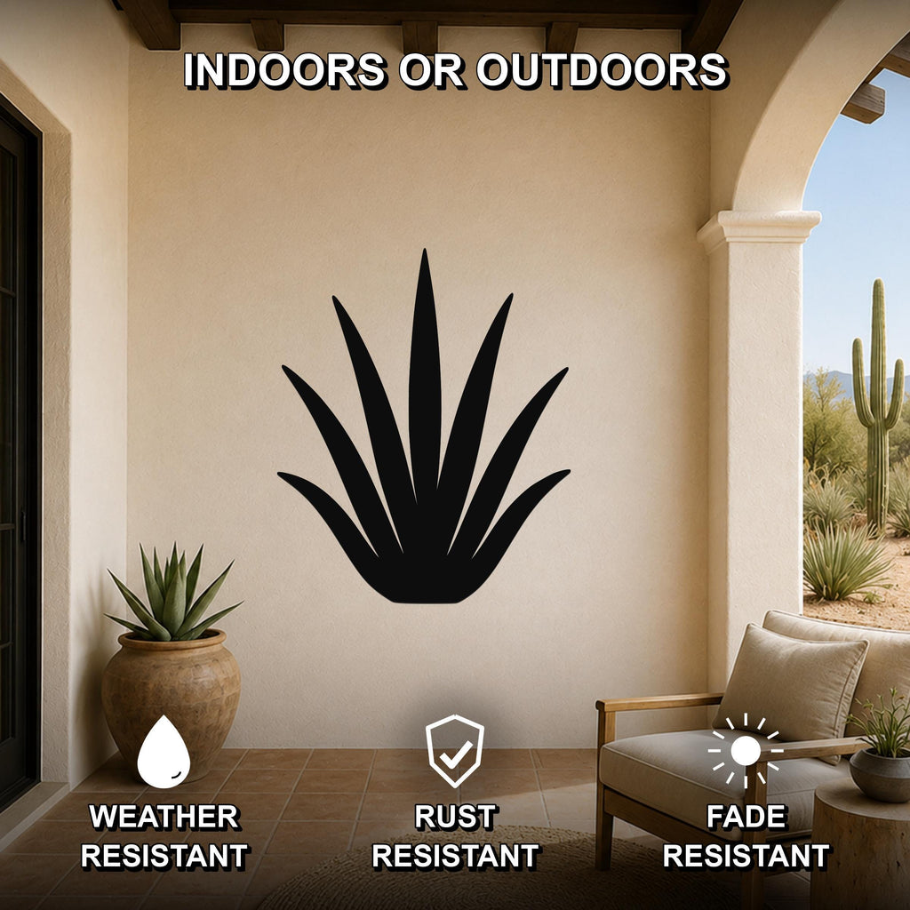 Black metal agave wall art silhouette mounted on a beige outdoor patio wall, weather resistant, rust resistant, and fade resistant, with a potted plant and chair nearby.