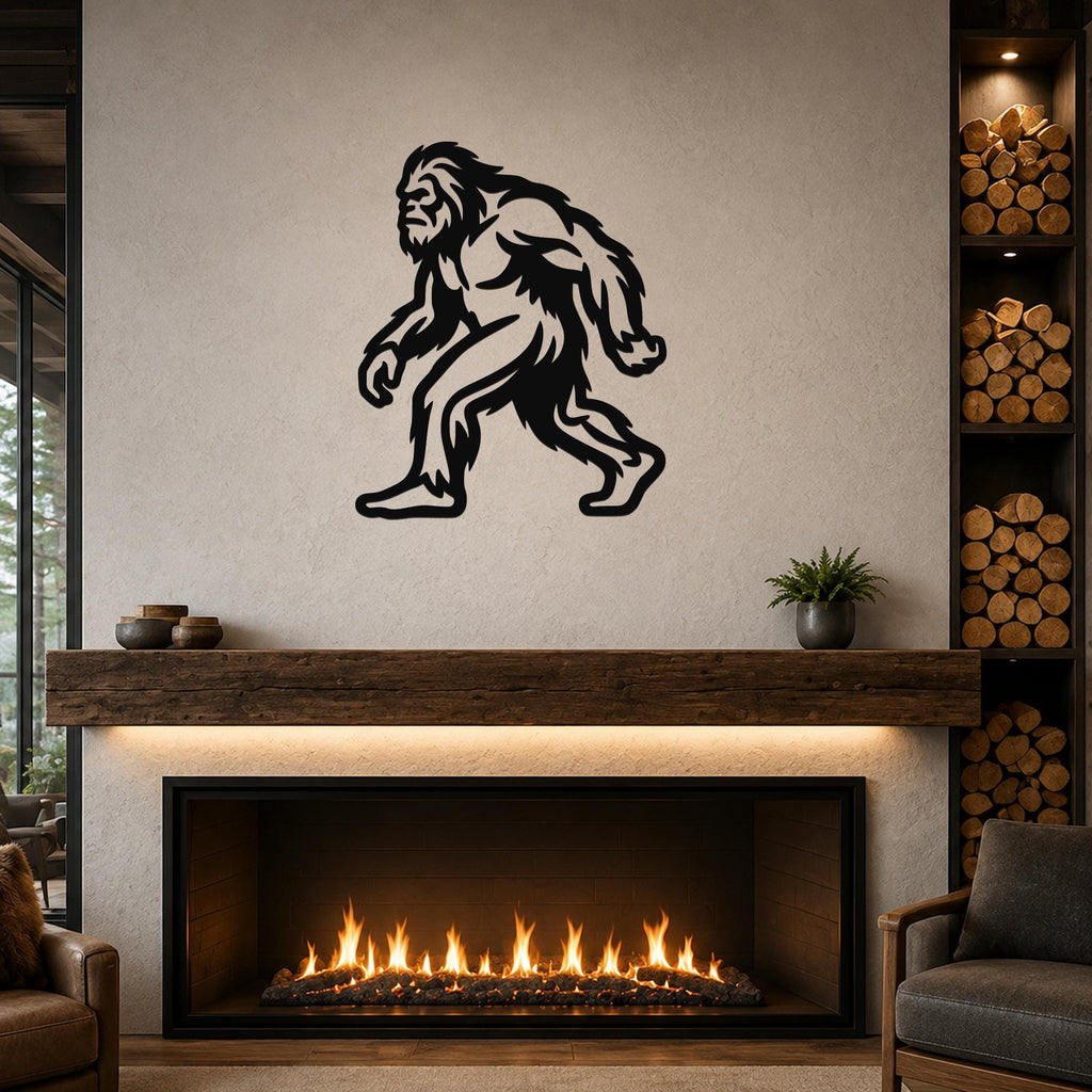 Black metal Bigfoot wall art silhouette with detailed fur and motion lines, mounted above a fireplace in a living room.