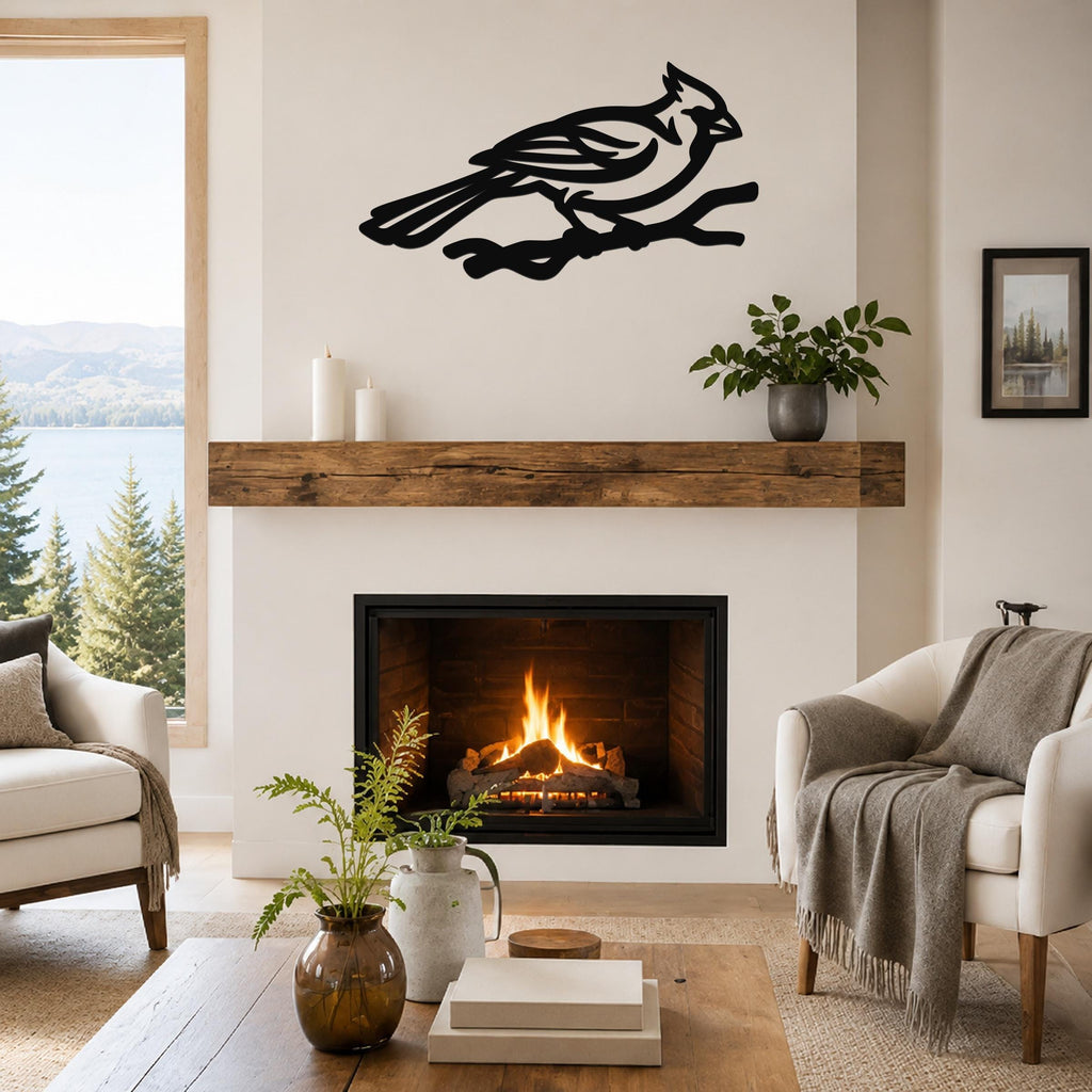 Black metal cardinal wall art in a bold silhouette cutout, mounted above a fireplace in a living room.