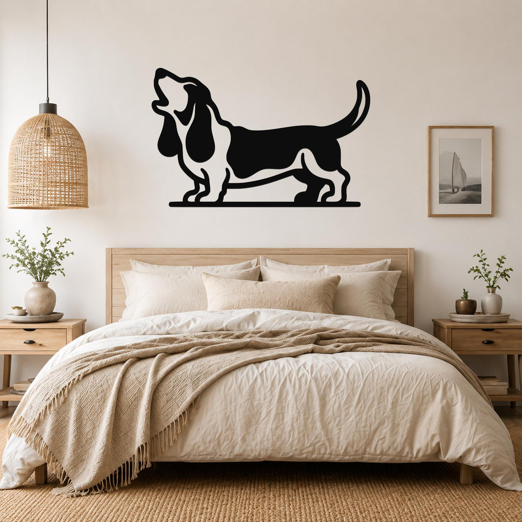 Black metal wall art of a howling basset hound silhouette, mounted above a bed in a neutral bedroom.