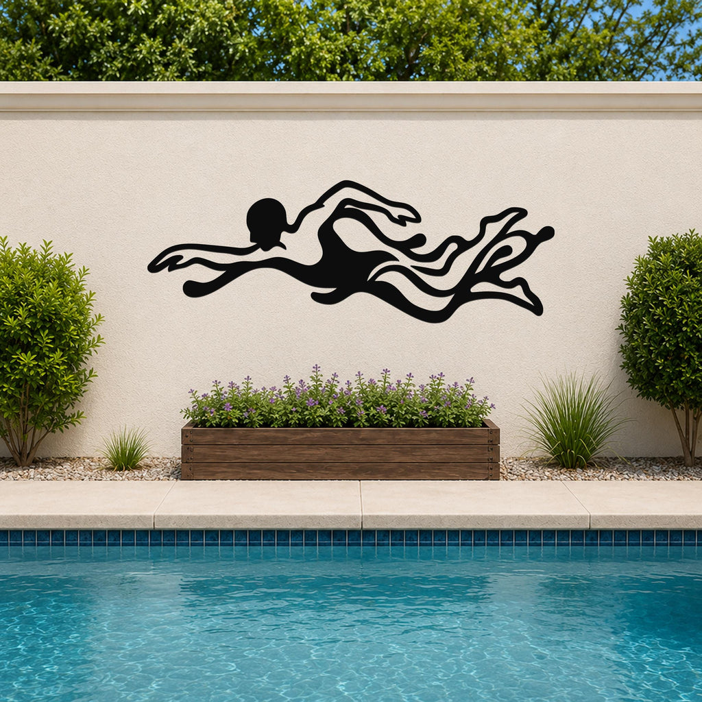 Black metal swimmer wall art with flowing motion cutouts, mounted on an outdoor wall above a poolside planter.