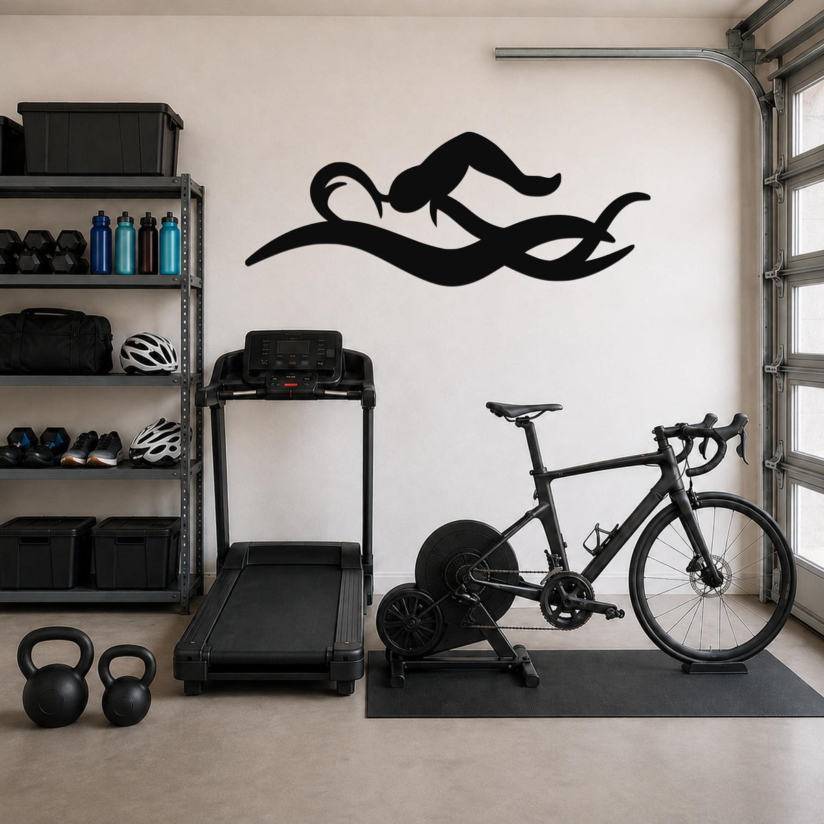 Black metal swimmer wall art with fluid motion cutouts, mounted above a treadmill in a home gym.