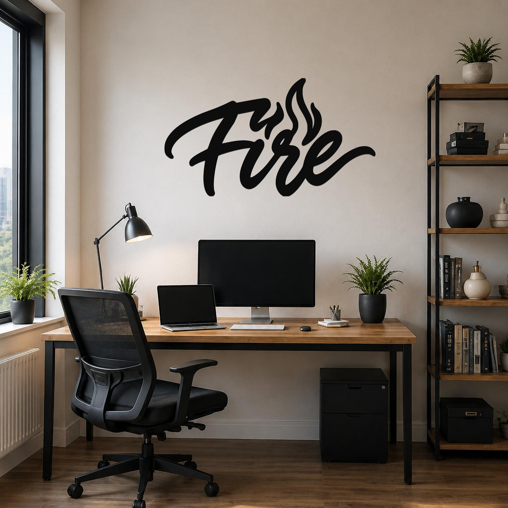 Black metal wall art with the word "Fire" in cursive script and flame-like cutouts, mounted on a beige wall above a wooden desk in a home office.