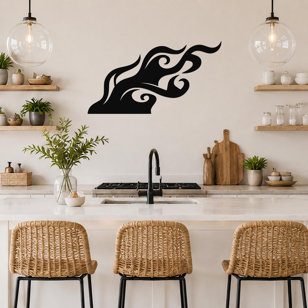 Black metal flame wall art with flowing silhouette cutouts, mounted above a kitchen counter.