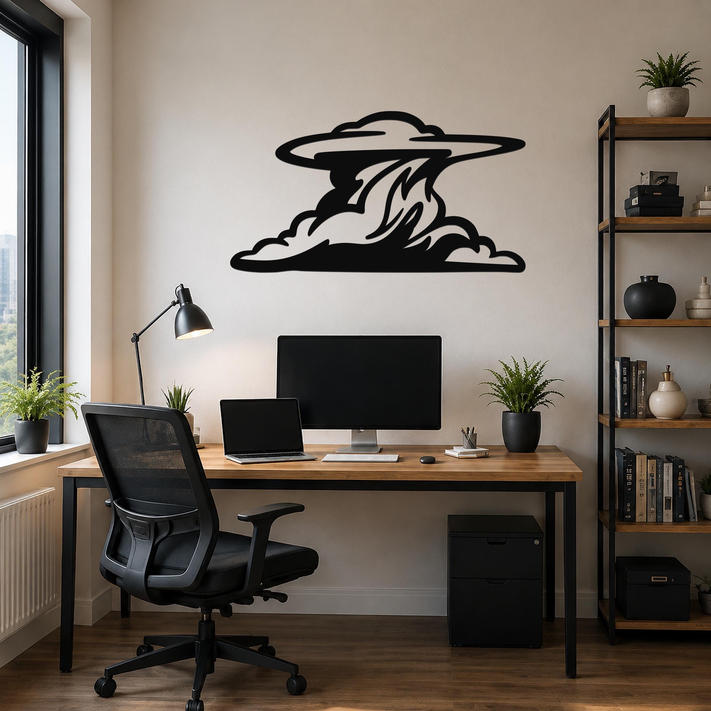 Black metal cloud wall art with flowing silhouette cutouts, mounted above a wooden desk in a modern home office.