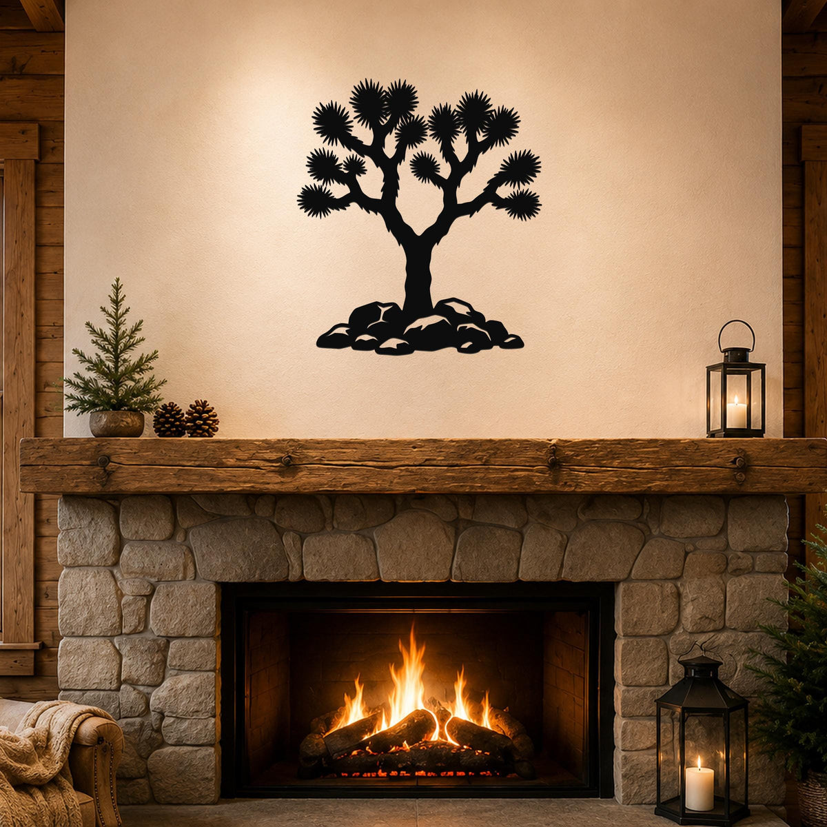 Black metal Joshua tree wall art with detailed branch cutouts, mounted above a stone fireplace in a rustic living room.