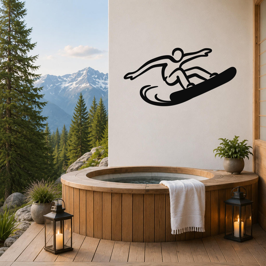 Black metal snowboarder wall art with dynamic silhouette cutout, mounted on a white wall above a wooden hot tub on a mountain-view deck.