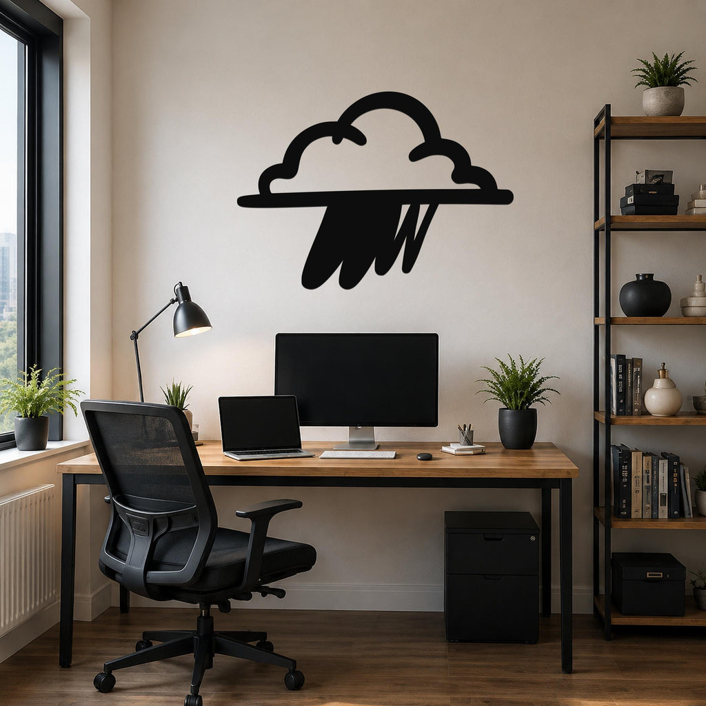 Black metal rain cloud wall art with raindrop cutouts, mounted above a wooden desk in a home office.