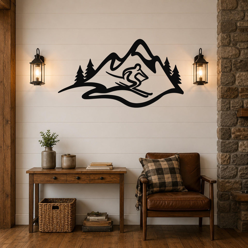 Black metal wall art featuring a skier silhouette descending a mountain with pine trees, mounted on a shiplap wall above a wooden console table in a living room.