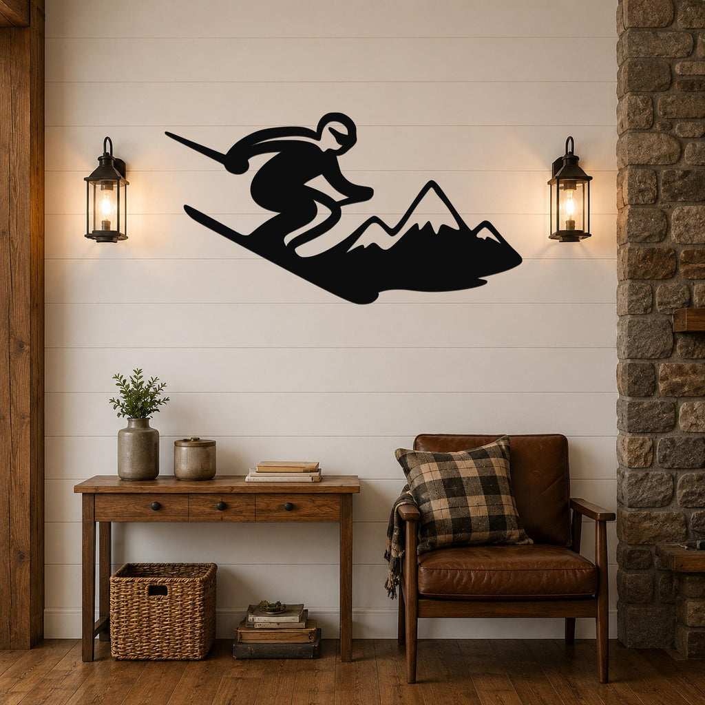 Black metal wall art silhouette of a skier in motion above a mountain, mounted on a shiplap wall between two lanterns in a living room.