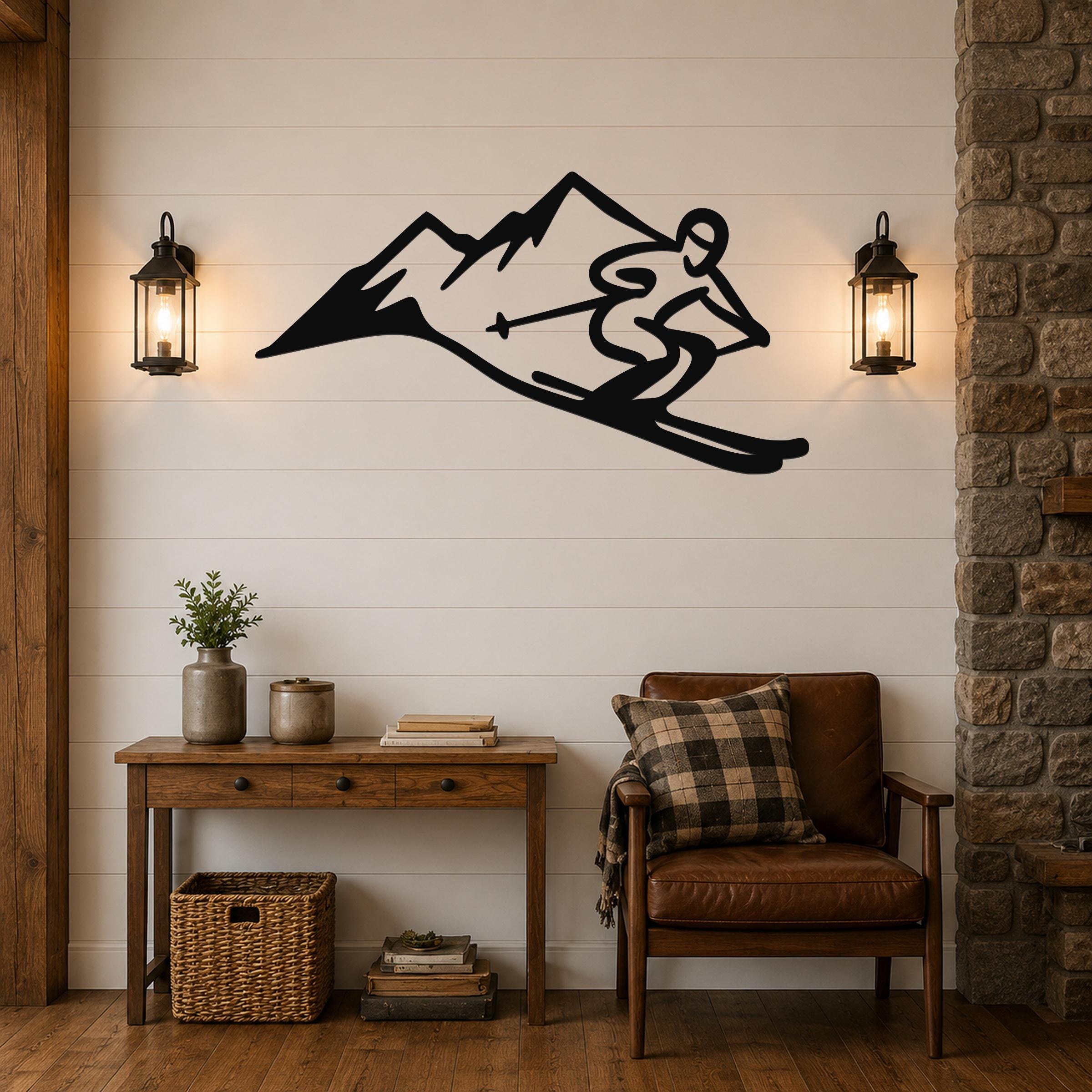 Black metal wall art cutout of a skier descending a mountain, mounted on a shiplap wall above a wooden console table in a living room.