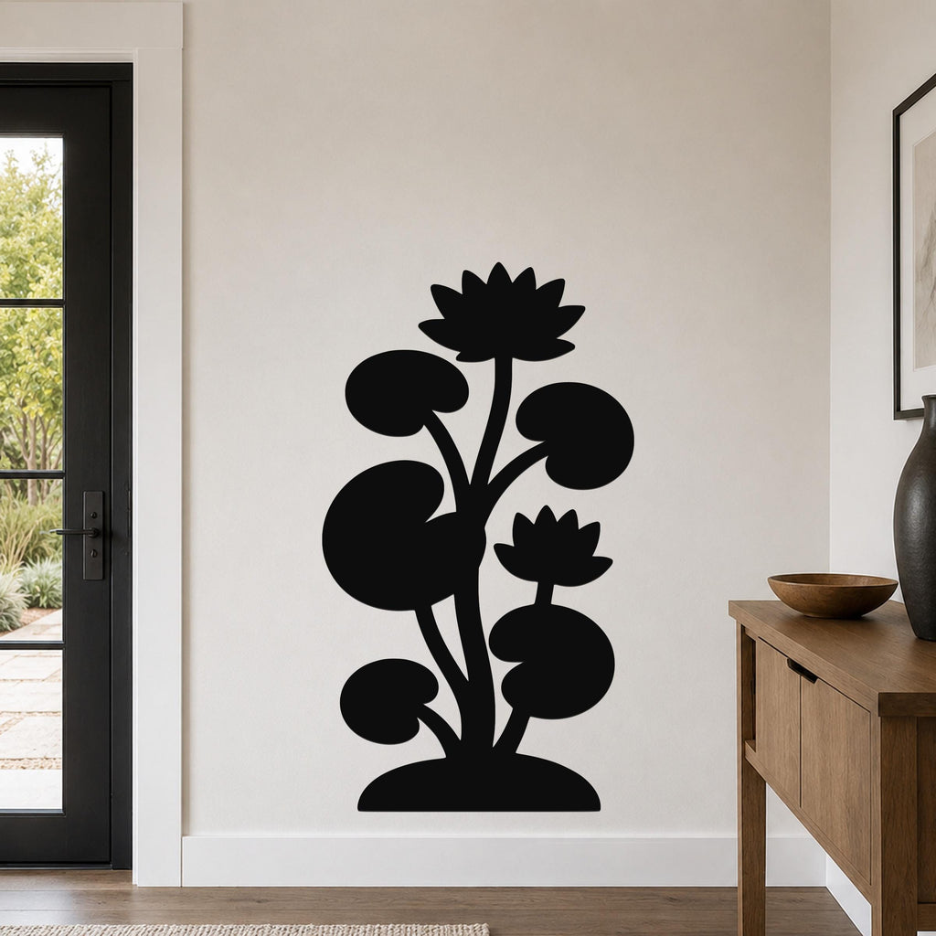 Black metal wall art silhouette of a lotus and water lily plant with multiple leaves and flowers, mounted on a white wall in a modern entryway.