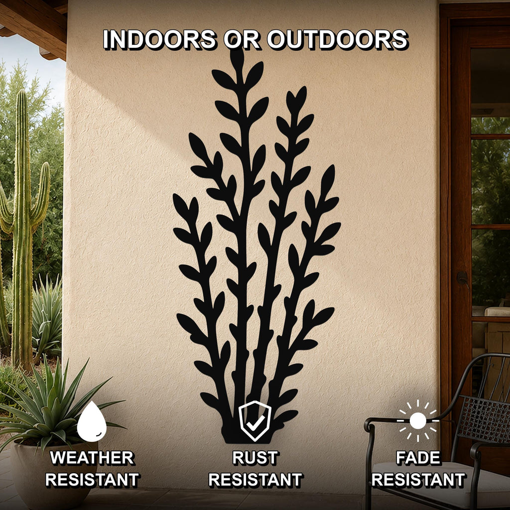 Black metal wall art with a desert branch silhouette, mounted on an outdoor patio wall, weather resistant, rust resistant, and fade resistant.