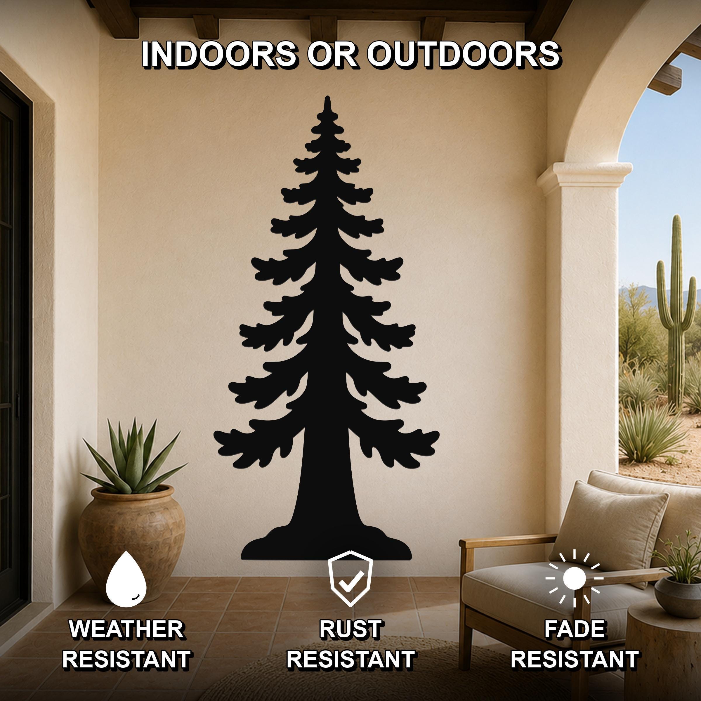 Black metal sequoia tree wall art with layered branch cutouts, mounted on a beige outdoor patio wall above a wooden chair and potted plant.