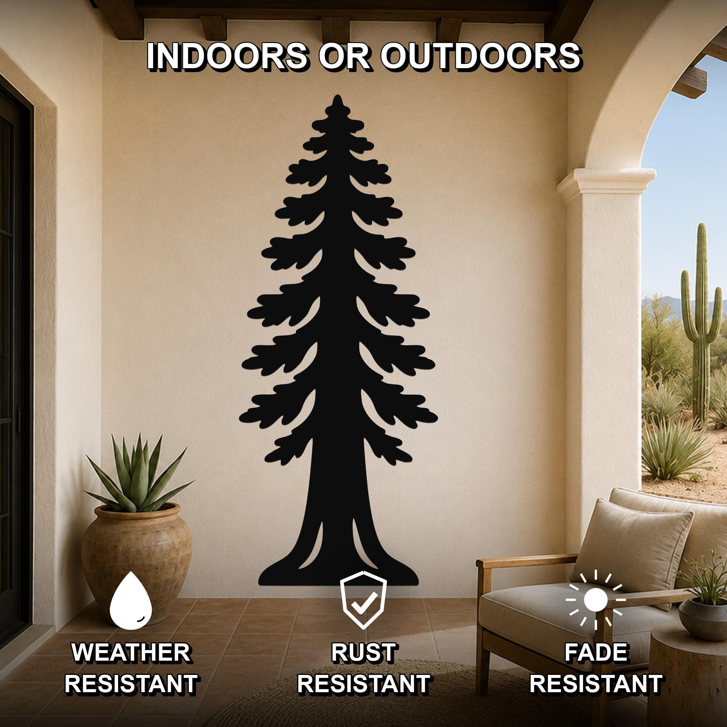 Black metal sequoia tree wall art with detailed branch cutouts, mounted on a beige outdoor patio wall above a wooden chair and potted plant.