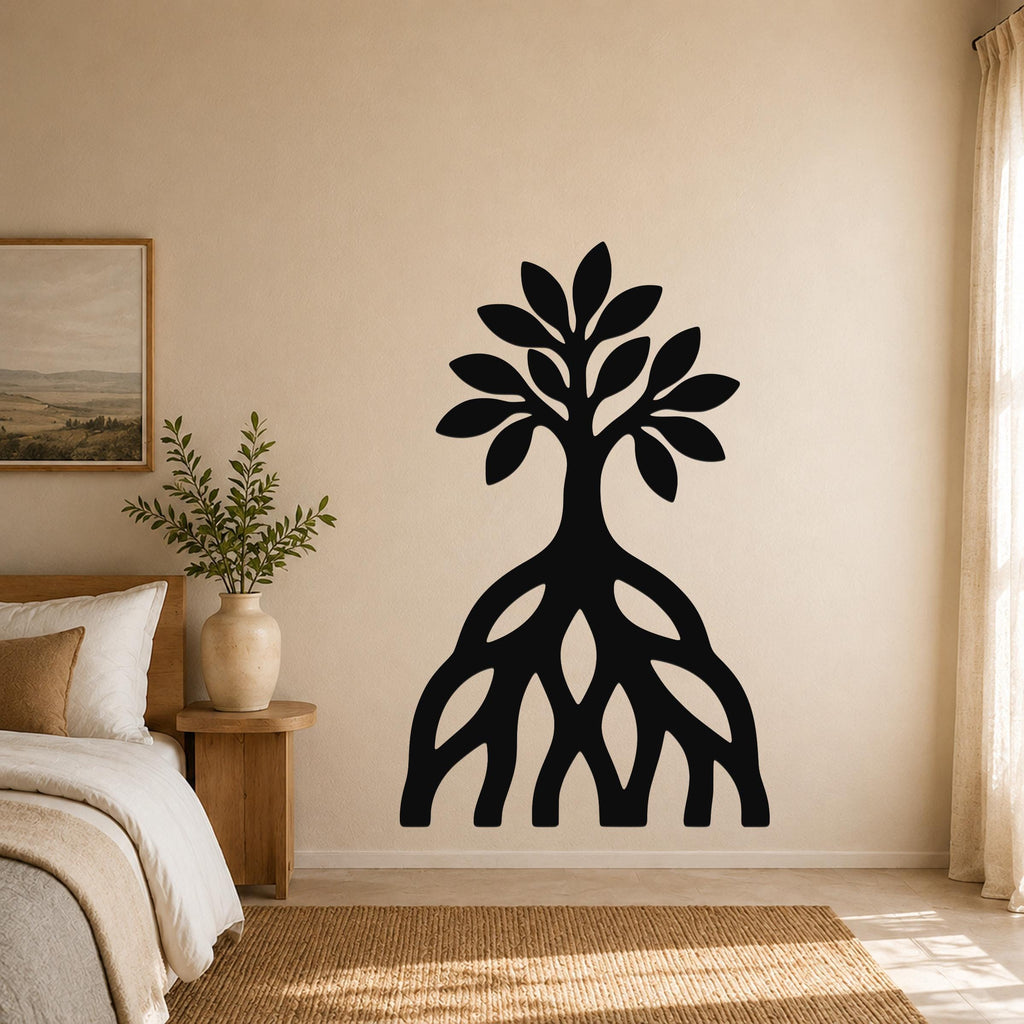Black metal wall art silhouette of a mangrove tree with visible root system, mounted on a beige bedroom wall above a woven rug.