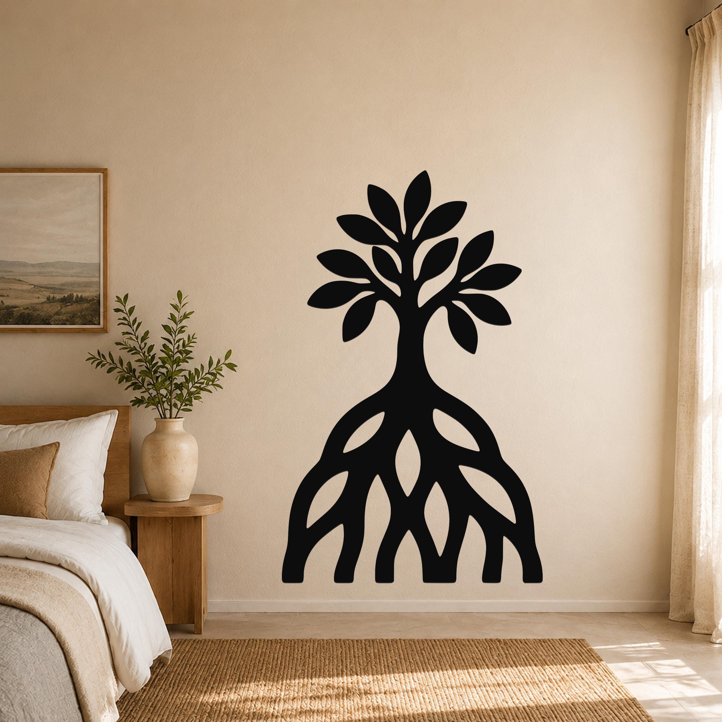 Black metal wall art silhouette of a mangrove tree with visible root system, mounted on a beige bedroom wall above a woven rug.