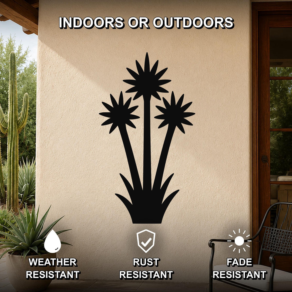 Black metal yucca wall art with three blooming flower cutouts, mounted on an outdoor patio wall, weather, rust, and fade resistant.