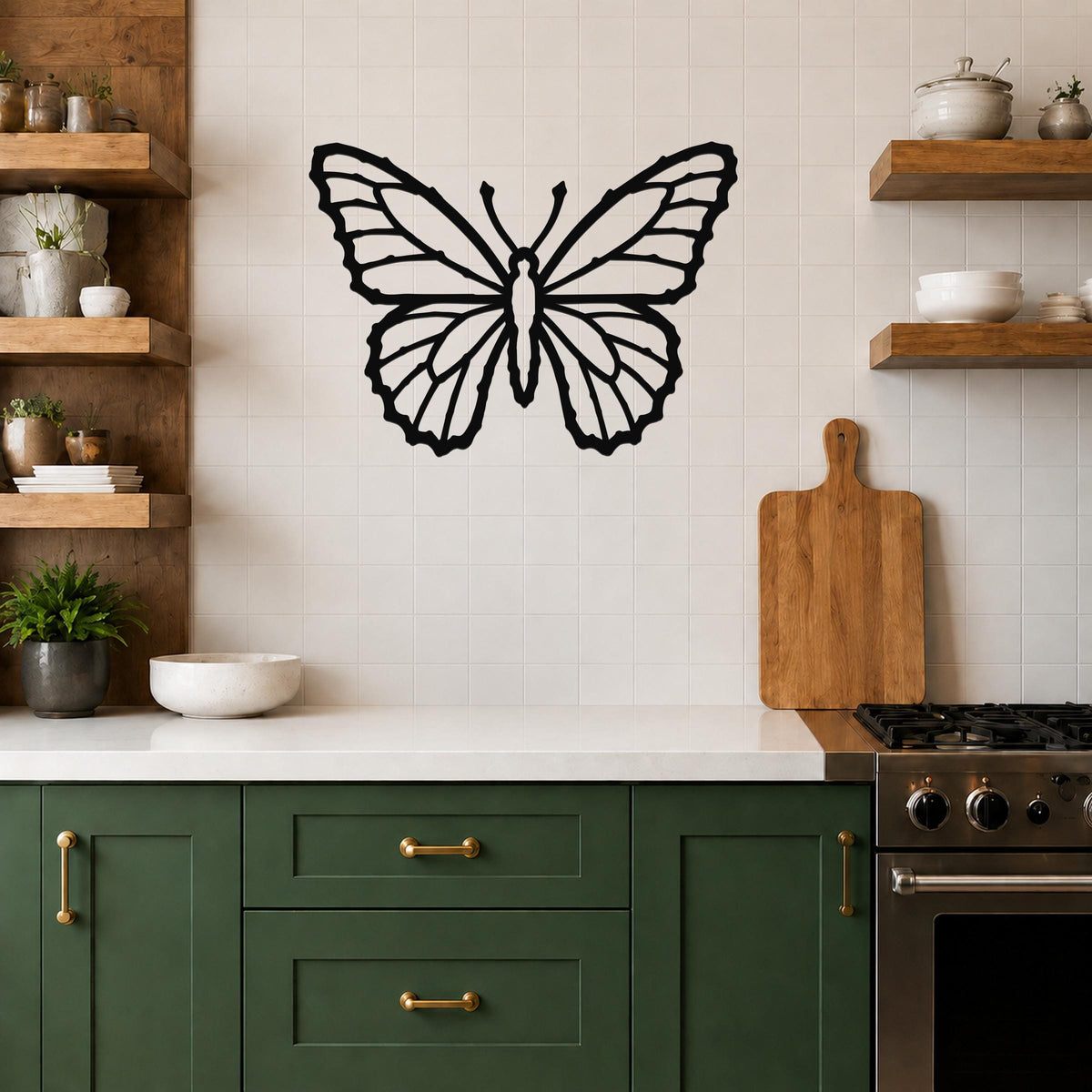 Black metal butterfly wall art with detailed wing cutouts, mounted on a tiled kitchen wall above a counter.