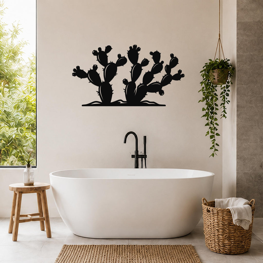 Black metal wall art in a prickly pear cactus silhouette, mounted above a freestanding bathtub in a modern bathroom.