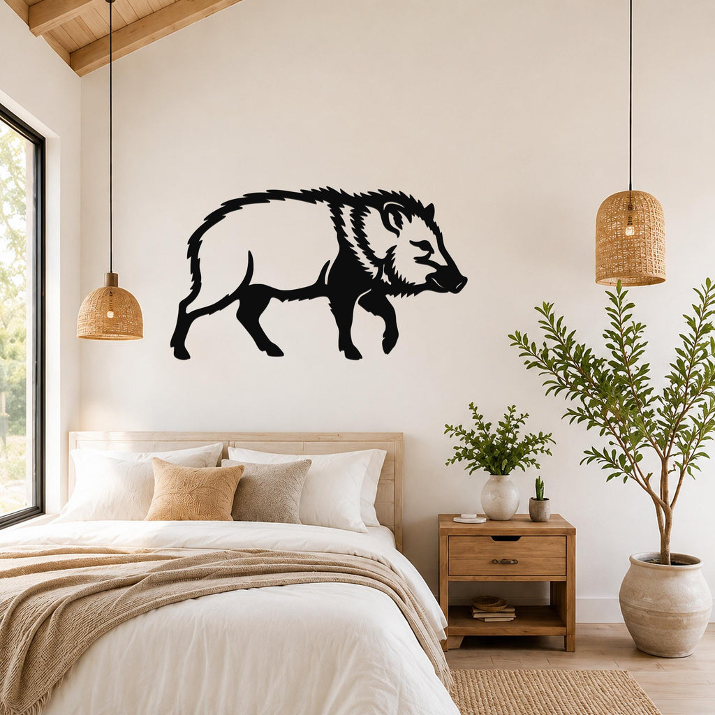 Black metal javelina wall art silhouette mounted above a bed in a bedroom with wooden furniture and woven pendant lights.