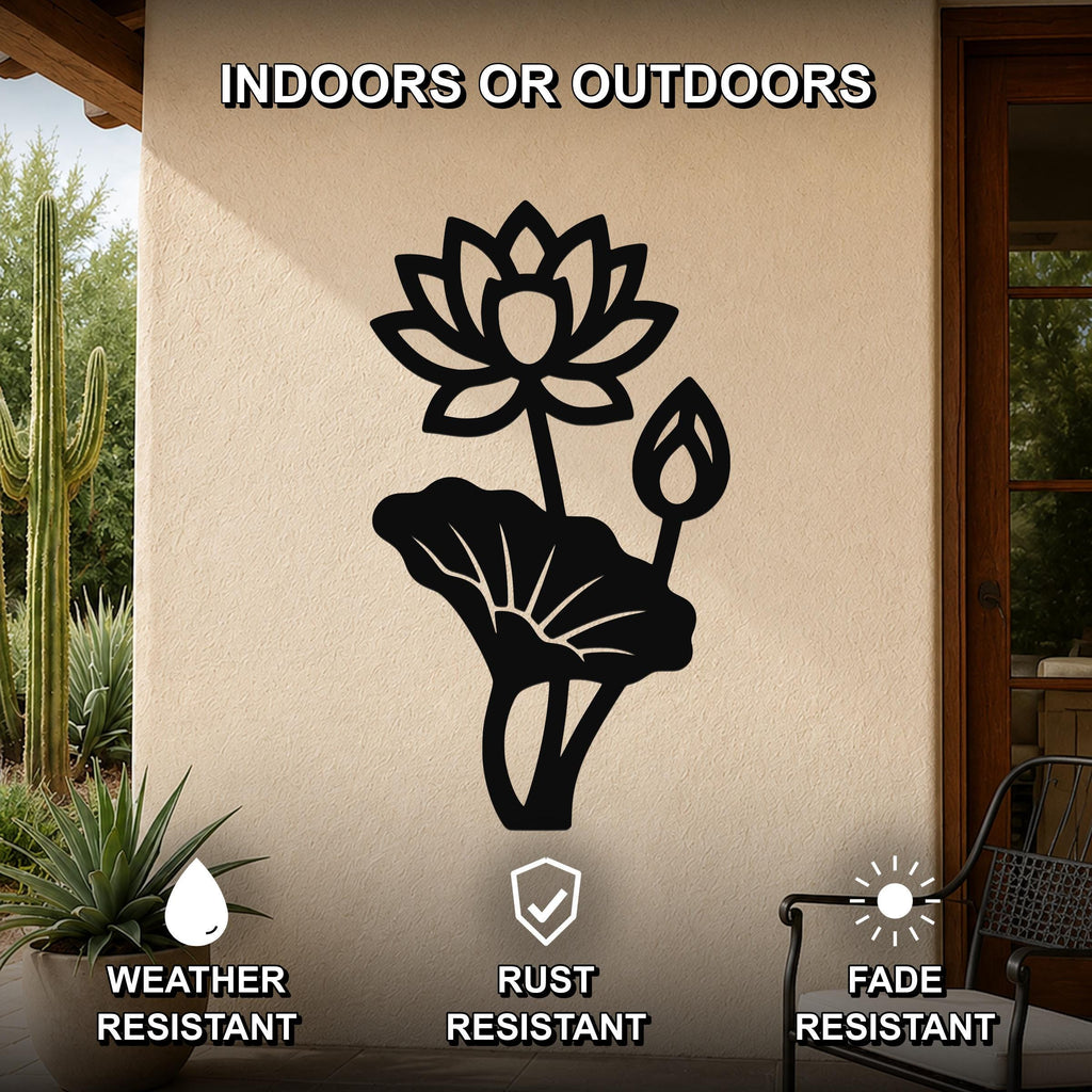 Black metal lotus flower wall art with a large bloom, bud, and leaf cutouts, mounted on an outdoor patio wall.