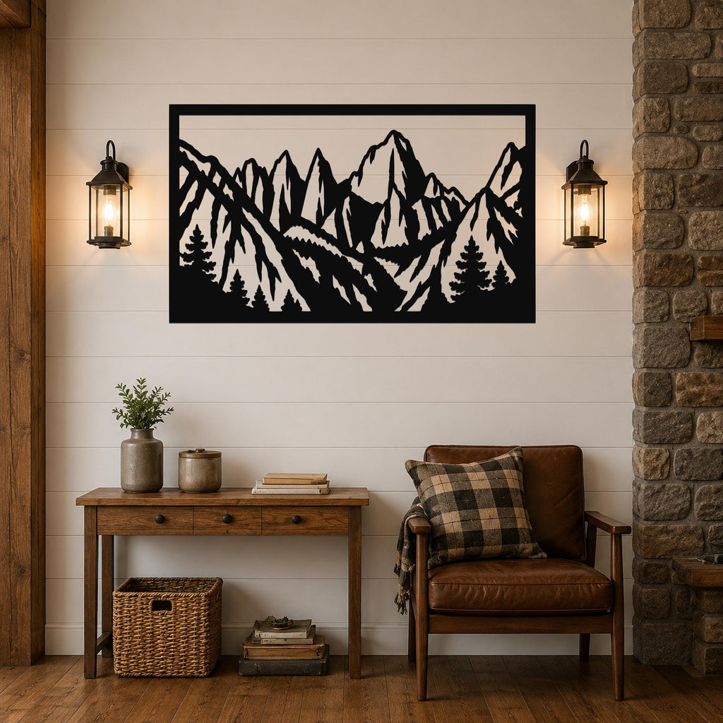 Black metal wall art with a mountain range and pine tree silhouette, mounted on a shiplap wall above a wooden console table in a rustic living room.