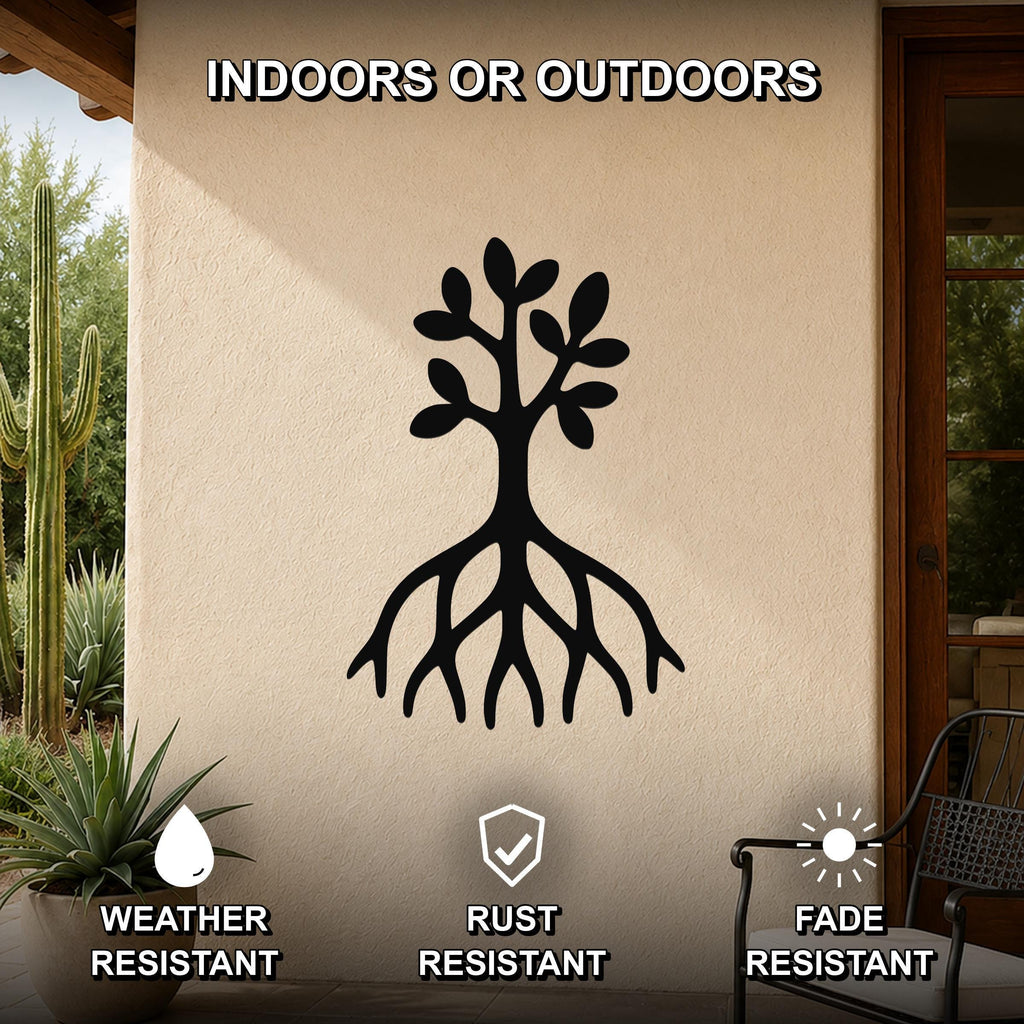 Black metal wall art featuring a tree silhouette with visible roots and leafy branches, mounted on an outdoor patio wall.