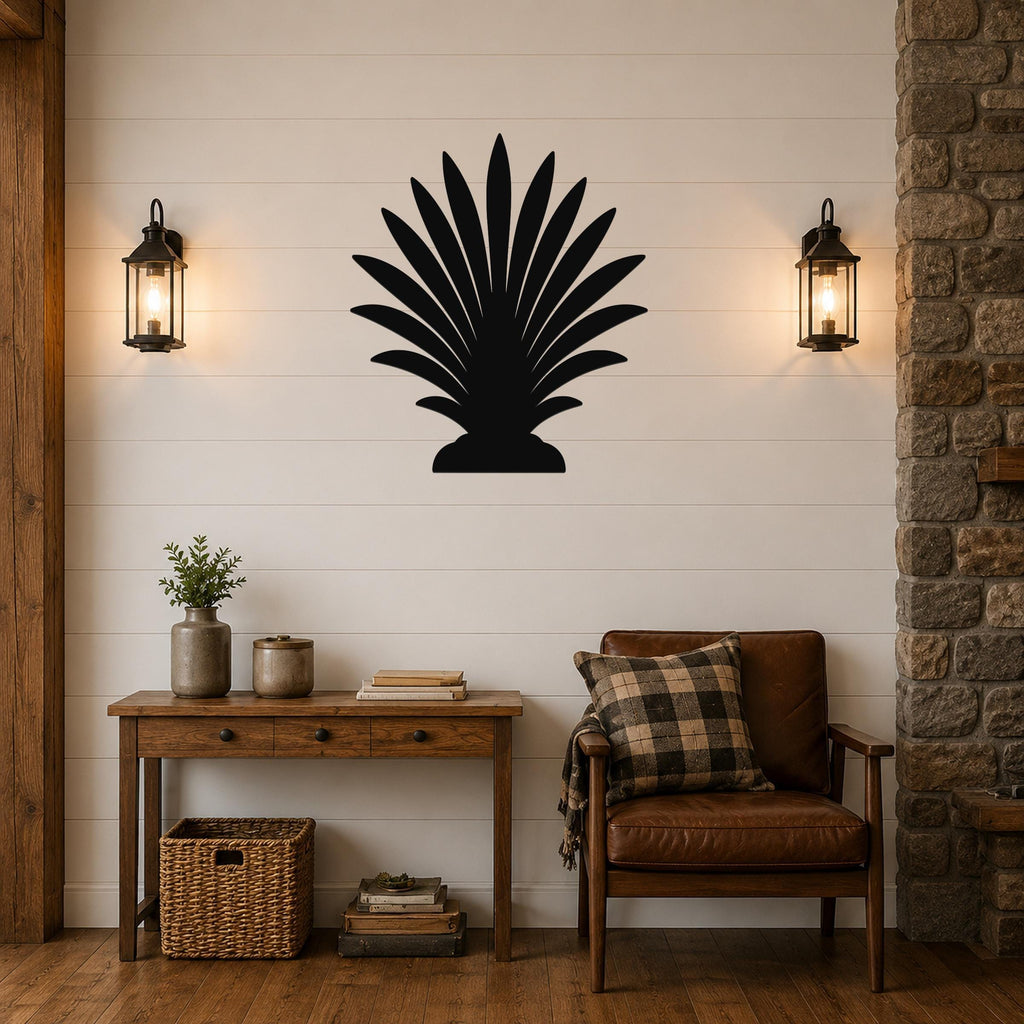Black metal palm tree wall art silhouette mounted on a shiplap wall above a wooden console table in a living room.