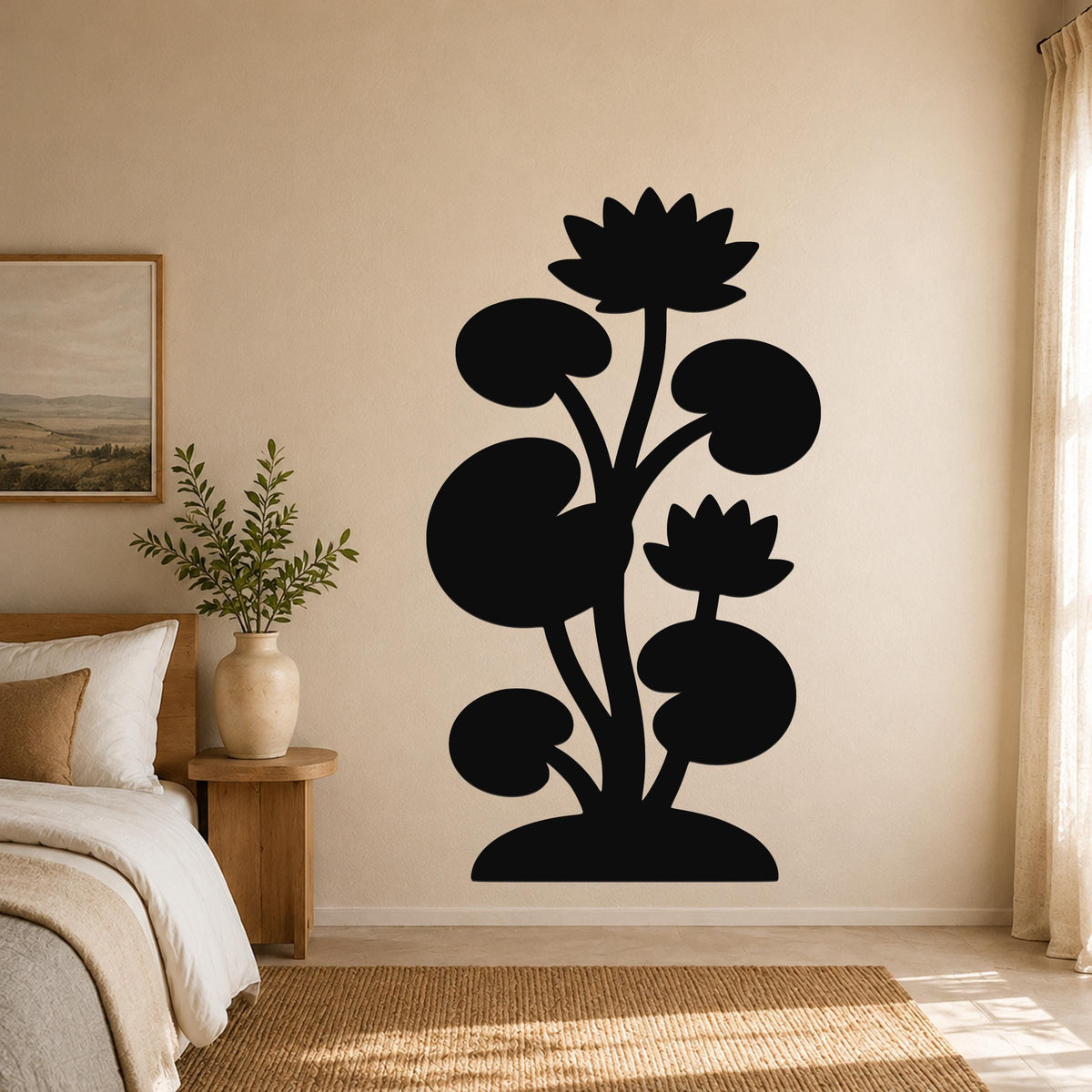 Black metal lotus water lily wall art with silhouette cutouts of flowers and leaves, mounted on a bedroom wall above a rug.