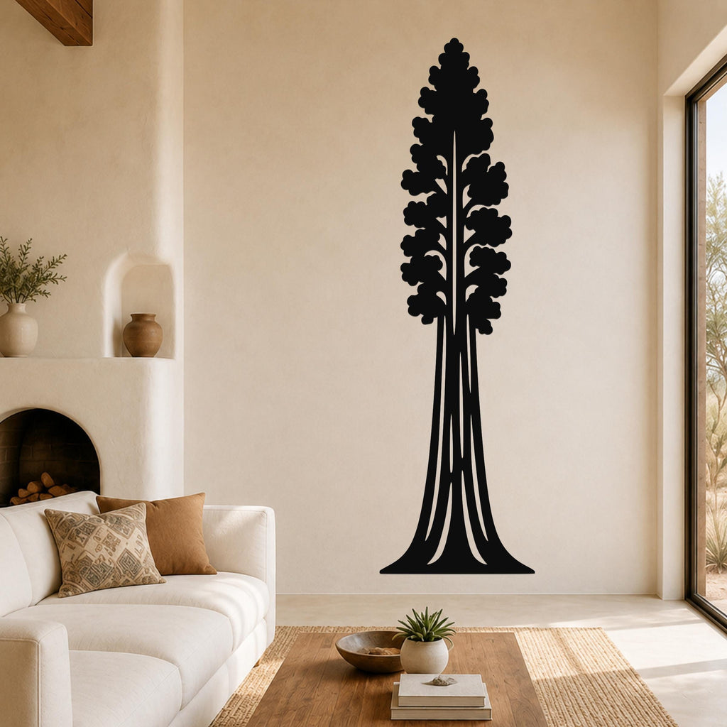 Black metal Sequoia tree wall art with detailed branch cutouts, mounted on a living room wall above a sofa.